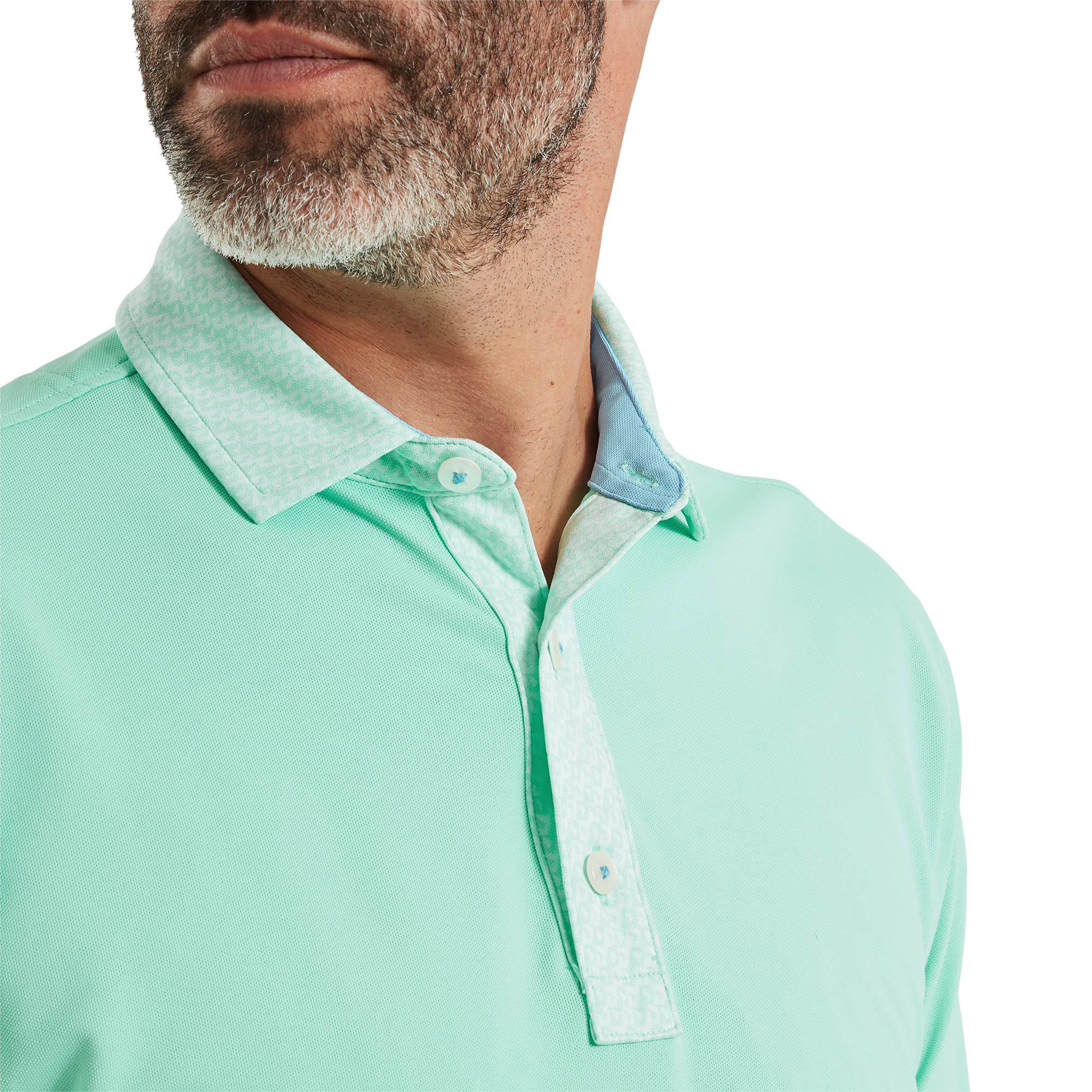 Polo piqu&eacute; aux d&eacute;tails g&eacute;om&eacute;triques