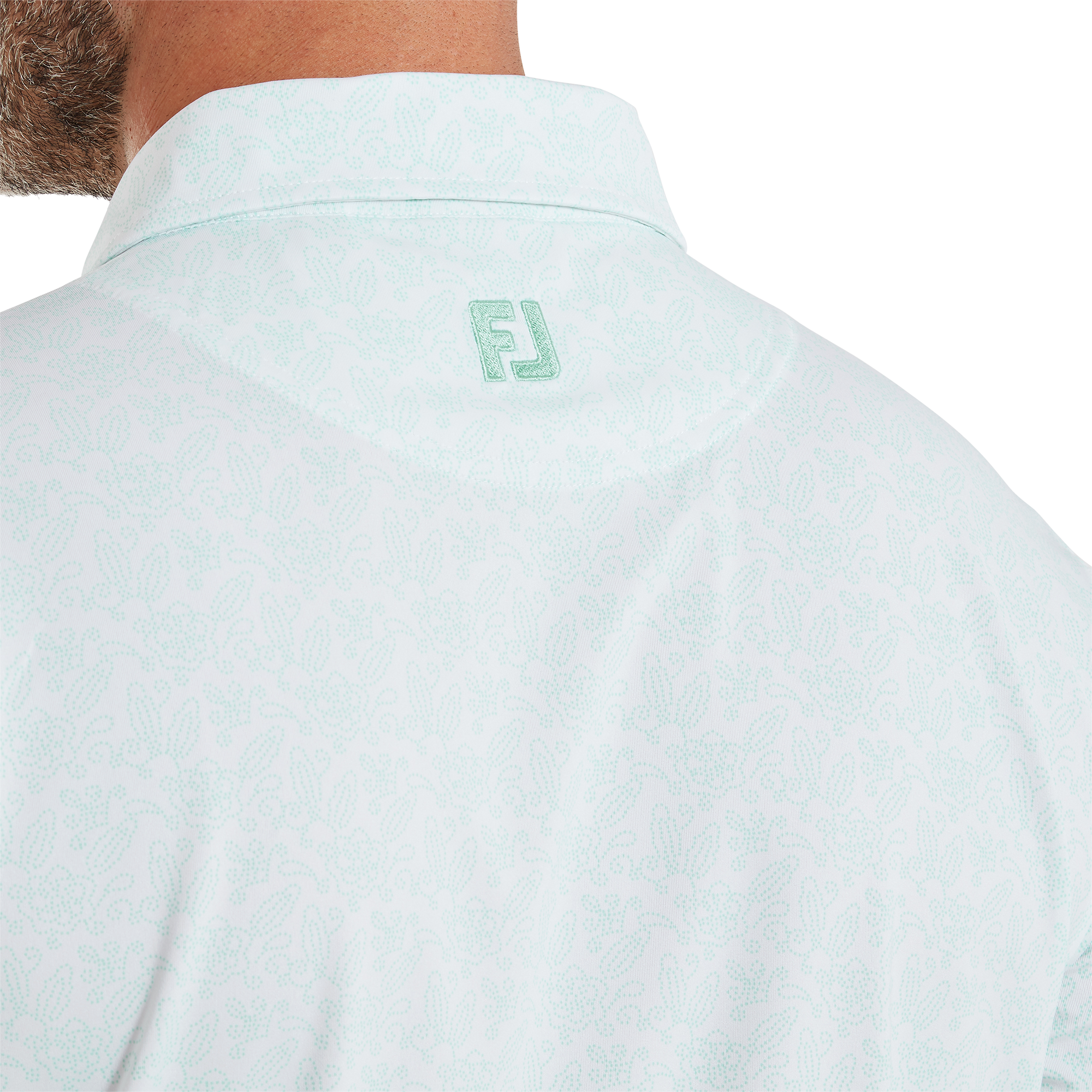 Polo en fil d'Ecosse imprim&eacute; fleuri