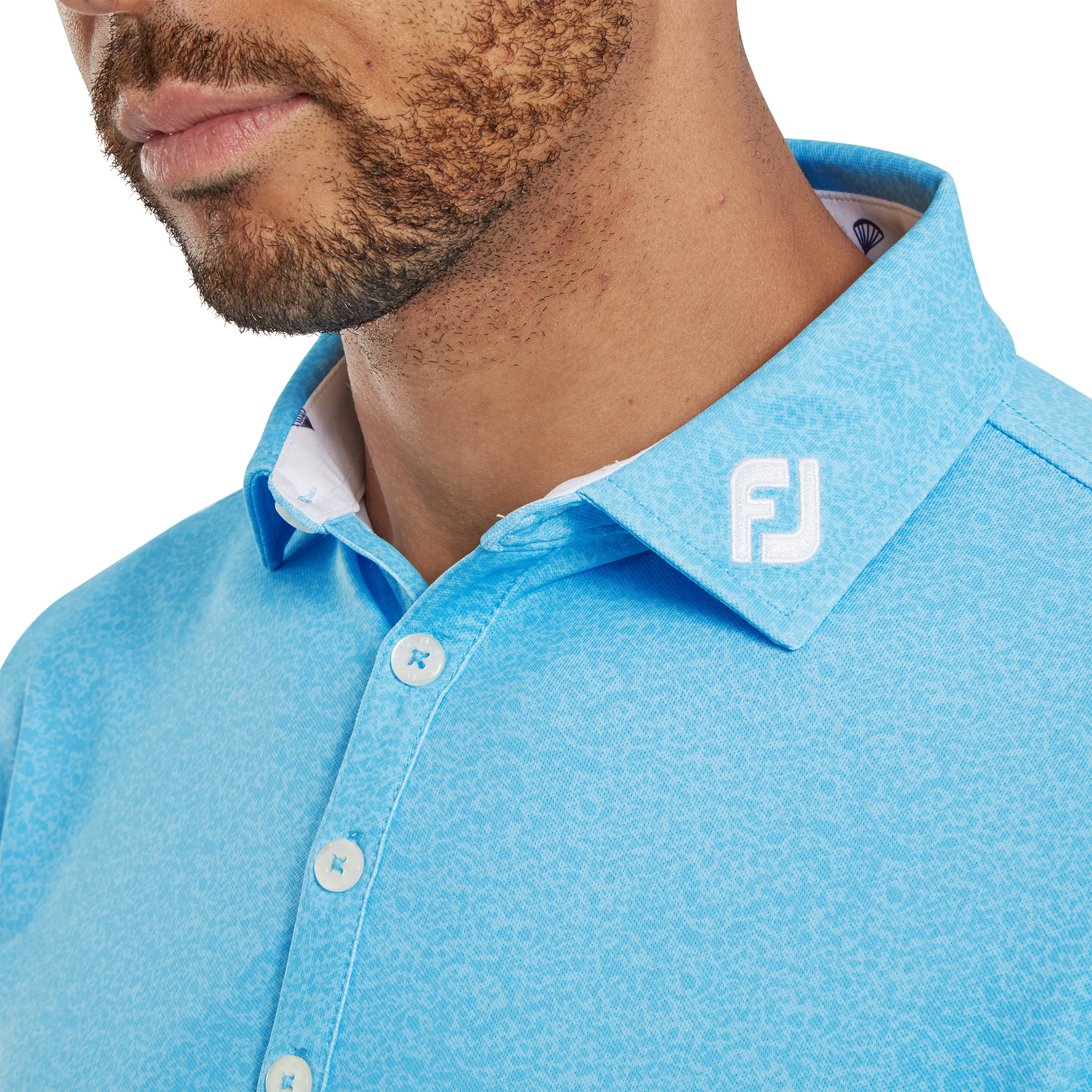 Piqu&eacute; mit Texturdruck und Fallschirmbesatz